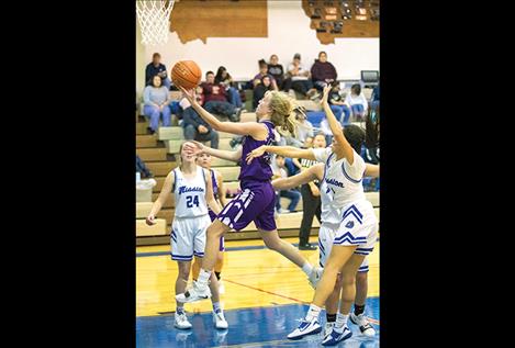 Charlo Lady Viking Carlee Fryberger races past the defense for two points. 