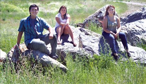 Arlee High School students Louis Bunce, Courtney Perry and Nichole Rang will soon travel halfway around the world to Cambodia for an American Youth Leadership Program — a U.S. State Department program — for nearly a month. Camaleigh Old Coyote of St. Ignatius, who was also selected for the trip, was unavailable for the photograph.