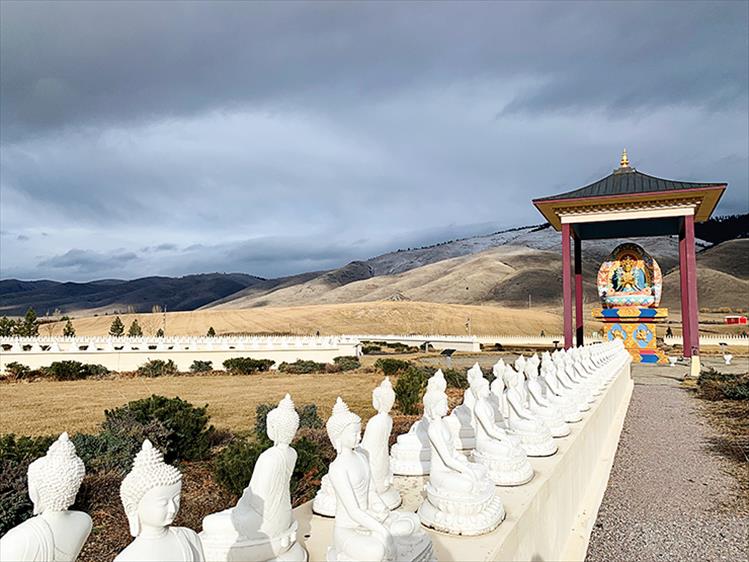 A moment of sun shines at the Garden of One Thousand Buddas in Arlee. 