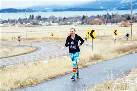 Jenni Brown,  of Polson, races towards her second first-place title in the female category.