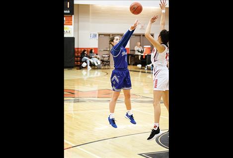 Lady Bulldogs Azia Umphrey shoots a jumper.