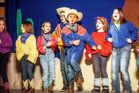 Ronan students perform a country play on Saturday at the elementary school.