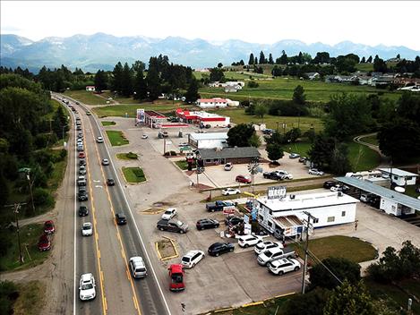 Richwine’s Burgerville gets a line of customers in the summer of 2019. 