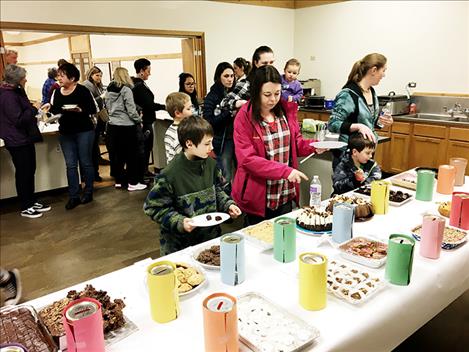Participants enjoy chocolate treats at the Arlee Brown Building during the 16th Annual Chocolate Lover’s Festival.