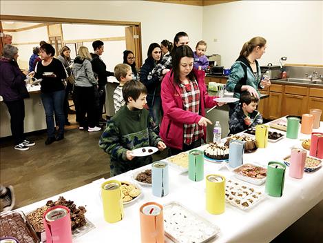 Participants enjoy chocolate treats at the Arlee Brown Building during the 16th Annual  Chocolate Lover’s Festival. 