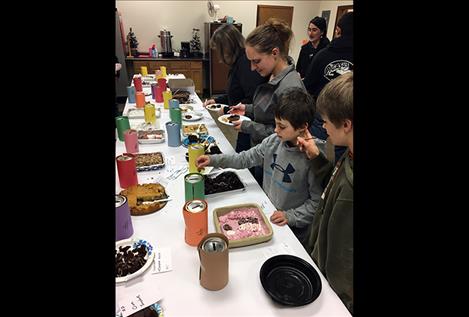 Participants enjoy chocolate treats at the Arlee Brown Building during the 16th Annual Chocolate Lover’s Festival.