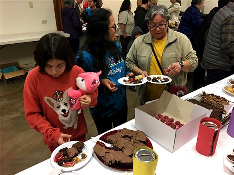 Participants enjoy chocolate treats at the Arlee Brown Building during the 16th Annual Chocolate Lover’s Festival.