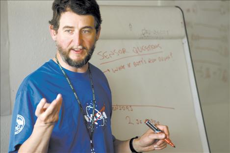 NASA scientist Charles Kankelborg, leader of the IRIS team at MSU, helps teach  participants about astrobiology during Space Camp at Blue Bay in 2006.