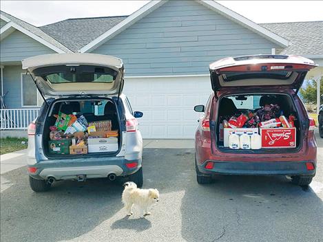 Vehicles are full of donations. 
