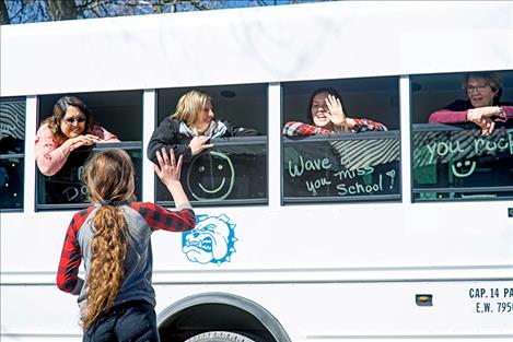 St. Ignatius  Middle School  paraprofessionals go on an adventure to see students while maintaining social distancing.