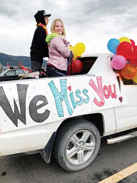 Teachers put messages on their vehicles for students to read during the parade.   