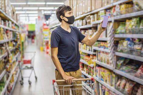 Healthcare professionals recommend wearing a mask while in the grocery store and when a six-foot distance is difficult to maintain.  