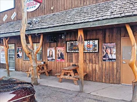 Banners can be seen on the local pizza shop in Arlee.