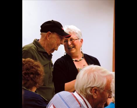 Joyce Decker Wegner shares a chuckle with Oscar Baertsch.