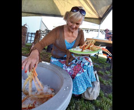 Roxy Coleman-Herak grabs some crab at the bi-annual fest.