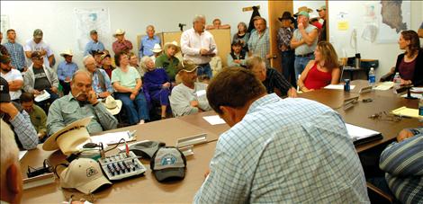 The Flathead Joint Board of Control meeting room is packed for a meeting with federal attorney on June 19.