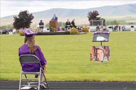 Violet Anderson watches the ceremony.