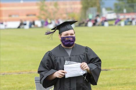Rob Zolman / Valley Journal Trevor Sanderson takes a moment for a photo op after receiving his diploma.