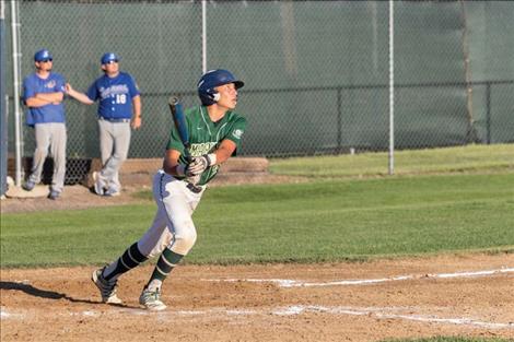 Mariner batter Alex Muzquiz watches one sail deep into the outfield.