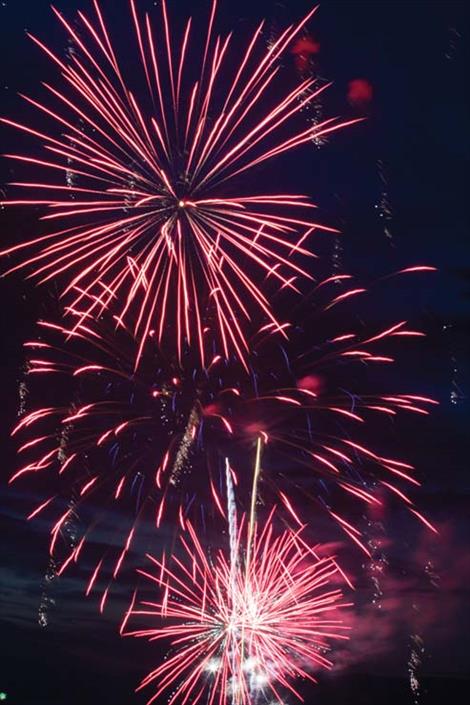 Fireworks  displays  light up Polson  during the  Fourth of July  celebration. 