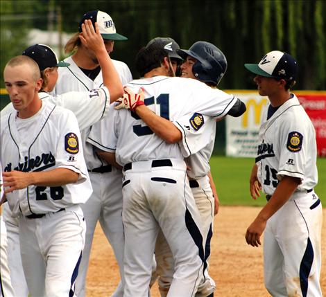 The Mission Valley Mariners celebrate a win last week. The team split a pair of conference games with the Bitterroot Bucs.