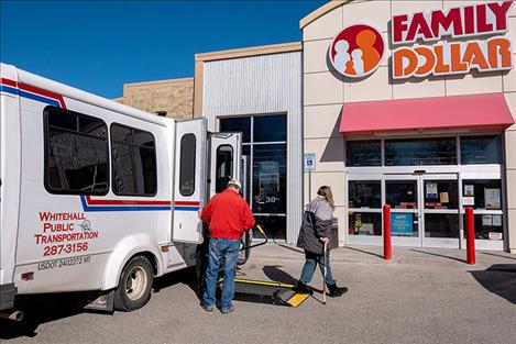 Whitehall resident Dee McHugh goes to shop at Family Dollar after Whitehall Public  Transportation bus driver LeRoy Murphy let her off the bus Feb. 21, 2020.