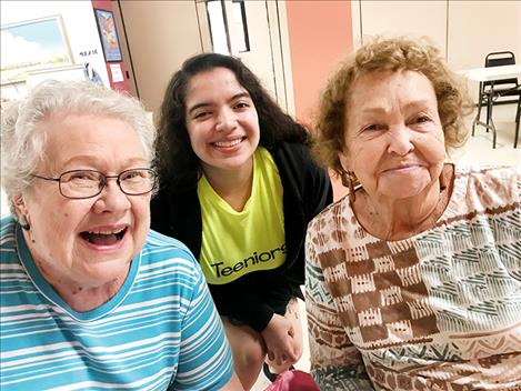 Teeniors participants Linda Haverty, Kendra Gonzales and Mary Frame pose for a photo.  Elderly adults feel they are treated with respect and teens feel they are making a difference. 