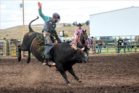 Morgan Shepard stays focused as she competes in the pole bending event during a high school rodeo event back on Sept. 14, 2019 at the Polson Fairgrounds. 