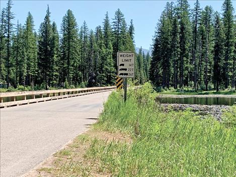 Highway at Clear Water River located at Seeley Lake