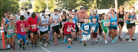 Participants in the one, four and seven-mile races get a running start at the 2012 Buffalo Run in St. Ignatius.