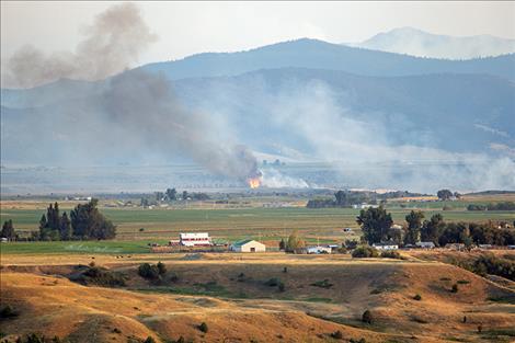 The Polson area fills with smoke due to a human-caused fire.