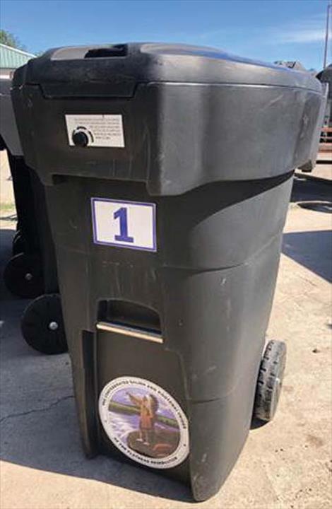 Examples of 65-gallon bear-resistant garbage cans, available through the Confederated Salish and Kootenai Tribes' Wildlife Management Program.