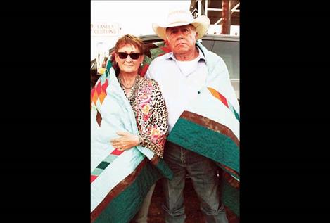 Arlyss (left) and Clint Long were honored July 11 at the Wild Horse Stampede in Wolf Point for  decades of service leading the volunteer-based Stampede  committee.