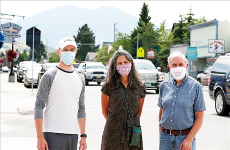 Therese Picasso-Edwards, center, and Stephen Kalb-Koenigsfeld, left, of the Red Lodge Community Foundation, and foundation board member Don Redfoot stand on Broadway in Red Lodge on Wednesday, Aug. 5.