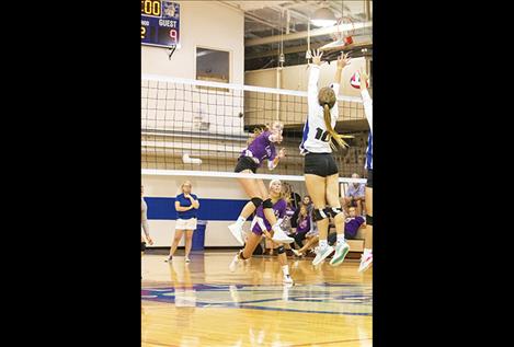 Lady Viking Kassidi Cox rifles a shot past Lady Bulldogs defenders.