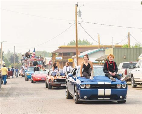 The Mission Homecomming court makes their way down the parade route.