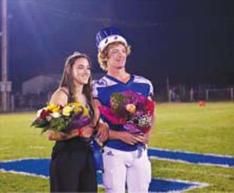 Mission Homecoming Queen Sydney Brander and King Layne Spidel pose for a quick photo.