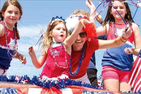 The Hughes family of Valley View celebrated the 4th of July by riding atop a float in Polson’s parade.