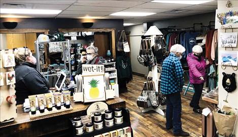 Krista Denning visits with customers at Sweet Home Montana Designs.