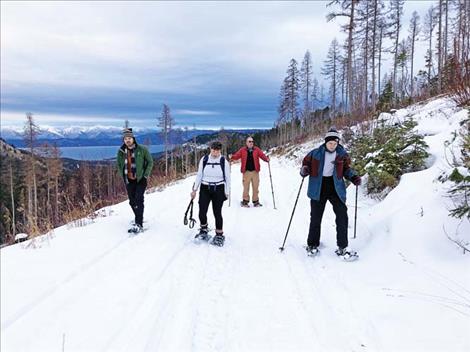Snow-shoeing offers an alternative for exploring the winter landscape for the Moll and Cadigan families. 