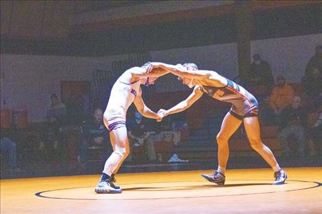 Ronan Chief Caleb Cheff and Mission/Charlo Bulldog Charlie Adams prepare to battle.