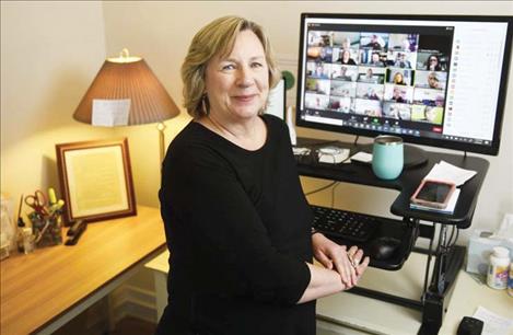 Mary Windecker, director of the Behavioral Health Alliance of Montana, works from her home office in Missoula on Feb. 9, 2021. 