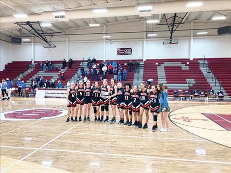 The Ronan Maidens pose for a photo with their second place trophy.