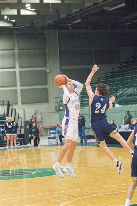 Polson Pirate Colton Graham shoots a jumper.