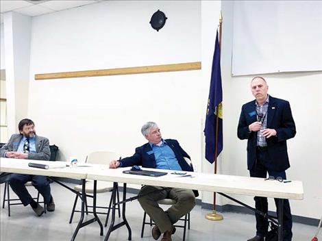 Rep. Joe Read and Sen. Dan Salomon, both of Ronan, look on while Sen. Greg Hertz, of Polson, answers a question during last week’s mid-session legislative update.