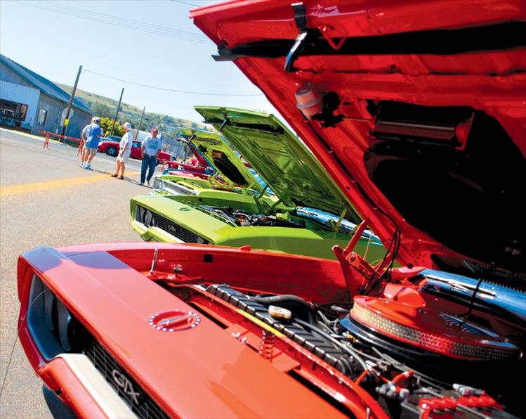 The Valley Cruisers’ Cruisen By The Bay annual car show drew more than 1,000 participants and spectators to Polson. This row of Plymouth GTXs and Roadrunners was a magnet for fans of the cars .