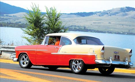 In their ‘55 Chevy, Tim and Sue Arneson drive across the Armed Forces Memorial Bridge during the cruise on Aug. 10.