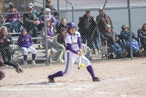 Polson Lady Pirate Mossy Kauley makes contact for a base hit.