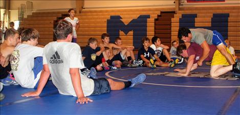 Cole Rice explains a wrestling technique