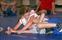 Kids wrestle with technique at Iron Dog camp